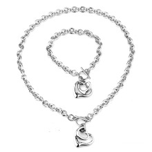 Vente chaude en forme de cœur bijoux en acier inoxydable bijoux collier féminin creux pendentif